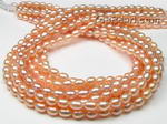 5-6mm pink rice shape cultured freshwater pearl strands wholesale