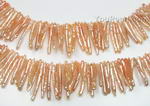 Fresh water cultured pink Biwa pearl, side drill strand whole sale